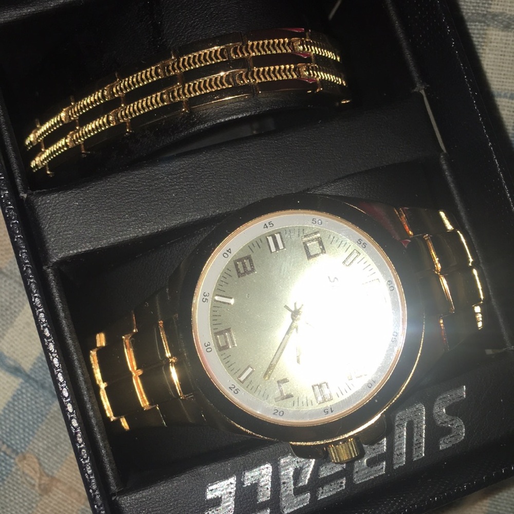 100 % stainless steel gold watch